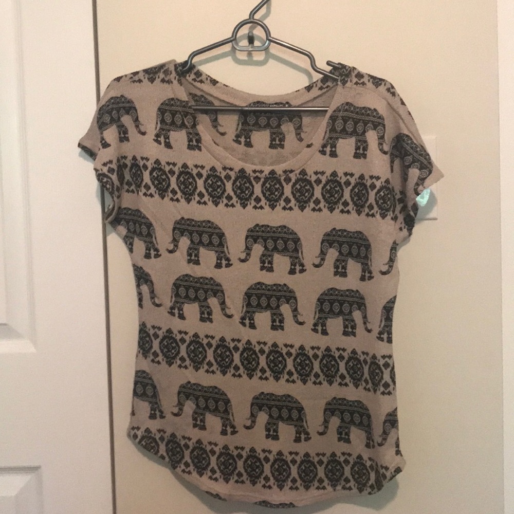Light brown and black elephant top